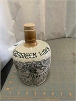 Old "Cruiskeen Lawn" Irish Whiskey jug, hairline