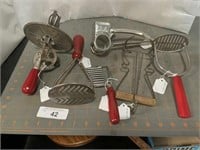 Assorted vintage kitchen utensils