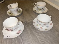FOUR LOVELY CUPS AND SAUCERS