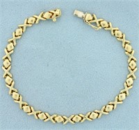 Italian Made X and O Design Bracelet in 14K Yellow