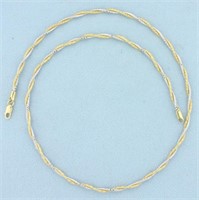 17 Inch Diamond Cut Snake Link Necklace in 14k Yel