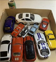 Assorted die Cast and plastic cars. Lot