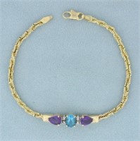 Blue Topaz, Amethyst, and Diamond Bracelet in 14k