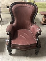 Leather nail head trimmed chair