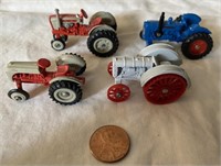 (4) Ford Tractors 1/64.