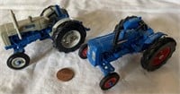 (2) Ford tractors. Parts Mart Special Edition.
