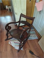 Vintage carved back rocking chair
