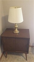 RECORD CABINET AND A TABLE LAMP