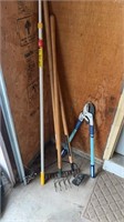 Garden tools, hoe, rake, pruner