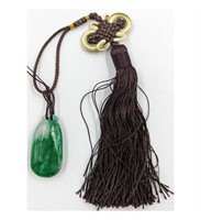 A Large Chinese Jadeite Pendant With Tassel