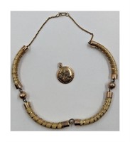 A Finely Carved Necklace With 14K Gold Wire And P