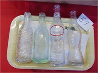 4 Empty Soda Bottles