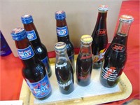 7 Unopened Soda Bottles