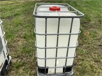 2 approx 500 Litre Plastic Tanks with cages and