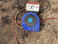 Air hose Reel with approx 50Ft of Hose. Small