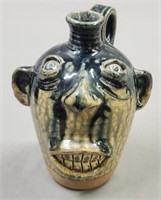 N.C, Face Jug Signed