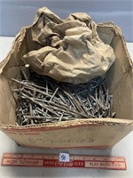LARGE BOX OF NAILS INCLUDING 5 INCHES