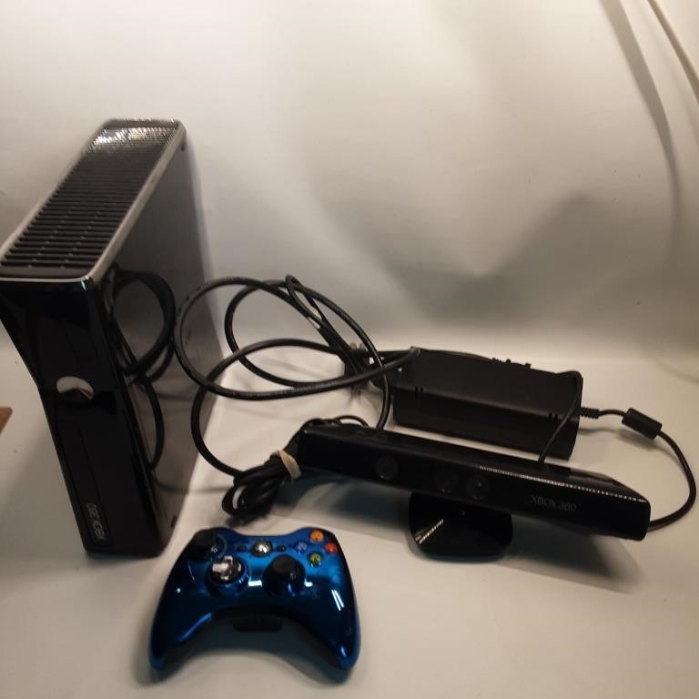 working Xbox with accessories and cord