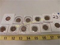 11 Indian head pennies:  1865, 1877, 1899, 1880,
