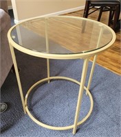 Metal end table with glass top. 22×20.