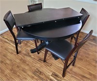 Dining room table with 4 chairs and 17in leaf.