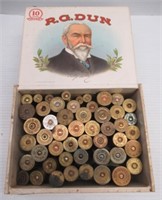 Vintage cigar filled with various vintage shotgun