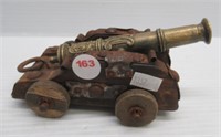 Decorative cannon, wood and brass.