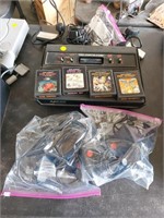 Atari 2600 w/4 games and controllers