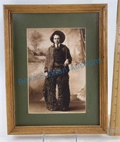 Framed photo of a 1920s cowboy with great woolly