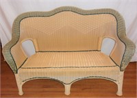 Resin wicker love seat.