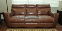 Dual reclining leather sofa