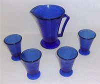 Cobalt blue pitcher & 4 glasses.