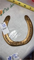 Gold- painted horseshoe