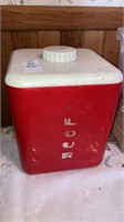 Vintage plastic red & wht canister of clothespins