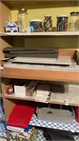 Shelf of stone slabs and miscellaneous items