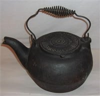 Vintage cast iron kettle.