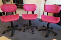 Matching office chairs on casters with adjustable