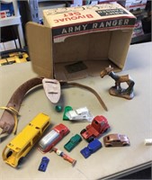 Toy assortment in vintage army playset box