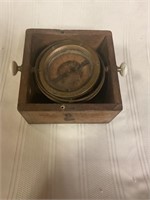 Large compass in wooden box