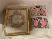 Floral photo frames and framed sign