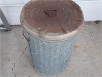 metal can - good for chicken or bird feed