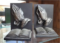 Praying hands bookends.