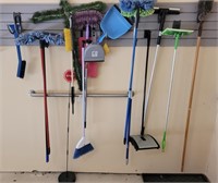 Miscellaneous cleaning tools etc on rack in