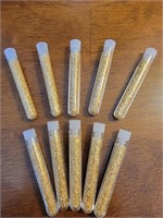 10 vials of gold flakes