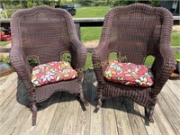 Two outdoor wicker rocking chairs