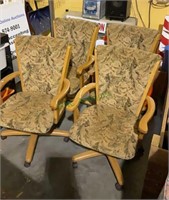 Set of four wooden arm chairs with padded seat