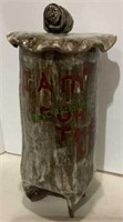 Handmade lidded ceramic jar inscribed "I aim for