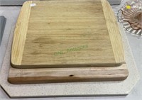 Lot includes two wooden cutting boards and one