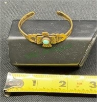 Infant brass bracelet with bird center and