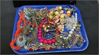 Tray of costume jewelry primarily necklaces